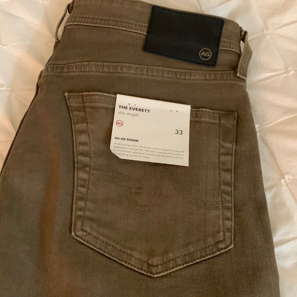 New with tag, size 33. AG MENS THE EVERETT DENIM army green.